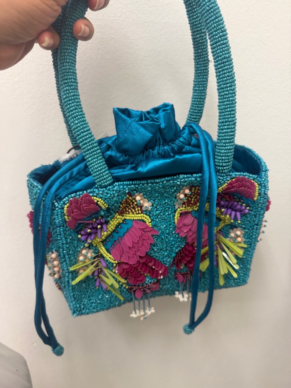 Beaded Teal Drawstring Handbag with Pink Feather Embellishments